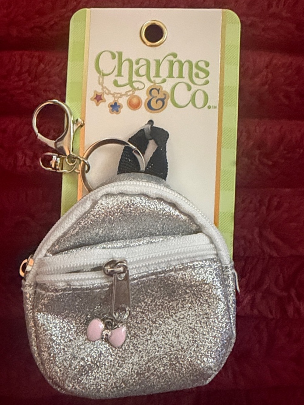 Charms & Co. Silver Glitter Mini Backpack Keychain with Pink Bow Charm
